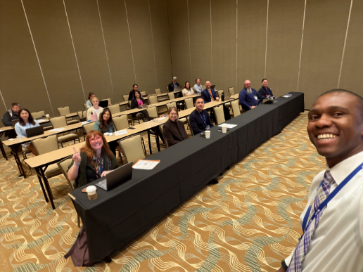 Dr. Geqigula Dlamini presenting at the CERA 2025 conference on generative AI for multilingual education program administration
