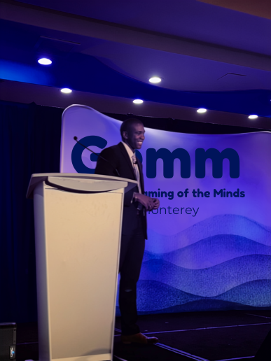Dr. Geqigula Dlamini delivering the Meeting of the Minds 2026 closing keynote